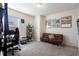 Inviting bedroom featuring a comfortable couch, desk, and bright, neutral decor at 1105 Grand Hammock Ct, Kissimmee, FL 34746
