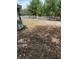 A spacious, partially fenced backyard offering ample space for recreation and outdoor activities at 1238 Lakecrest Dr, Apopka, FL 32703