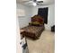 Cozy bedroom featuring tile floors, a ceiling fan, and a comfortable bed, perfect for relaxation at 1238 Lakecrest Dr, Apopka, FL 32703