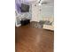 Well-lit living room featuring wood floors, modern decor, and a ceiling fan at 1238 Lakecrest Dr, Apopka, FL 32703