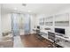 Well-lit business center equipped with multiple work stations and comfortable seating at 12843 Madison Pointe Cir # 106, Orlando, FL 32821