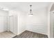 Bright dining room with wood floors and decorative wall molding at 12843 Madison Pointe Cir # 106, Orlando, FL 32821