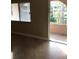Room with a window and door to balcony with views of exterior landscaped green space at 133 Oyster Bay Cir # 330, Altamonte Springs, FL 32701