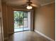 Room with sliding glass door to balcony with ceiling fan at 133 Oyster Bay Cir # 330, Altamonte Springs, FL 32701