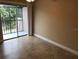 Room with sliding glass door to balcony with ceiling fan and natural light at 133 Oyster Bay Cir # 330, Altamonte Springs, FL 32701