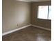 Cozy bedroom with tile flooring and natural light from the window at 133 Oyster Bay Cir # 330, Altamonte Springs, FL 32701
