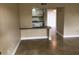 Cozy living space with tile floors and view into kitchen area, great for entertaining at 133 Oyster Bay Cir # 330, Altamonte Springs, FL 32701