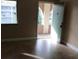 Comfortable living area featuring tile floors and a door to the outside at 133 Oyster Bay Cir # 330, Altamonte Springs, FL 32701