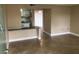 Open-concept living space with tile floors and view into bright kitchen at 133 Oyster Bay Cir # 330, Altamonte Springs, FL 32701