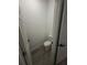 Cozy toilet room with wood-look flooring and white fixtures at 15259 Sw 51St Cir, Ocala, FL 34473