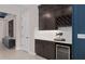 Beautifully designed bar area featuring cabinetry, wine storage, and built-in cooler at 15335 Rising View Dr, Montverde, FL 34756