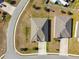 Aerial view showing a well manicured neighborhood and street at 1816 Forest Glen Dr, Fruitland Park, FL 34731