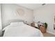 Bright bedroom featuring white linens, study desk and tiled floor at 1816 Forest Glen Dr, Fruitland Park, FL 34731