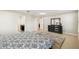 Spacious bedroom with a large walk-in closet and access to the bathroom at 1816 Forest Glen Dr, Fruitland Park, FL 34731