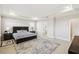Bright bedroom with a large walk-in closet and access to the bathroom at 1816 Forest Glen Dr, Fruitland Park, FL 34731