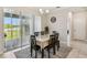 Charming dining room with natural light and view to outdoor area at 1816 Forest Glen Dr, Fruitland Park, FL 34731