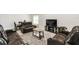 Spacious seating area with a coffee table and entertainment center at 1816 Forest Glen Dr, Fruitland Park, FL 34731