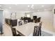 Open-concept living space combining kitchen, dining area, and living room for seamless entertaining at 1816 Forest Glen Dr, Fruitland Park, FL 34731