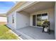 Covered patio with grill, perfect for outdoor dining and entertaining at 1816 Forest Glen Dr, Fruitland Park, FL 34731