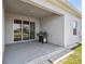 The house's covered patio is great for grilling and entertaining at 1816 Forest Glen Dr, Fruitland Park, FL 34731