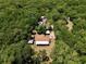 An aerial view of a single Gathering home nestled among mature trees at 18240 Lynbrook Rd, Orlando, FL 32820