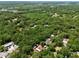 An aerial view showing a single Gathering home surrounded by lush greenery at 18240 Lynbrook Rd, Orlando, FL 32820
