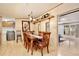 This dining room features a wood table and chairs and hardwood floors at 18240 Lynbrook Rd, Orlando, FL 32820