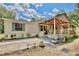 Inviting single-story home with a charming lattice porch and well-manicured landscaping at 18240 Lynbrook Rd, Orlando, FL 32820