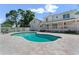 Large backyard with a refreshing pool, a spacious patio, and ample space for outdoor activities and relaxation at 1901 Lakeshore Cir, Longwood, FL 32750