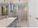 Updated bathroom featuring granite countertops, vanity with storage, and a glass shower at 1901 Lakeshore Cir, Longwood, FL 32750