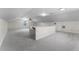 Spacious bonus room featuring neutral carpet, white walls, and natural light at 1901 Lakeshore Cir, Longwood, FL 32750
