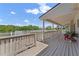 View of the covered deck overlooking the pool and spacious backyard, offering a tranquil outdoor living space at 1901 Lakeshore Cir, Longwood, FL 32750