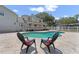 Inviting pool area with a brick patio and lounge chairs, perfect for relaxation and enjoying the outdoors at 1901 Lakeshore Cir, Longwood, FL 32750