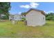 Durable storage shed situated in a well-maintained backyard near the main house at 1901 Lakeshore Cir, Longwood, FL 32750