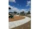 Community playground area featuring mulch and a nearby outdoor picnic area at 2082 Gold Dust Dr, Clermont, FL 34715
