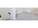 Hallway featuring neutral carpet and white walls leading to additional rooms at 2170 Derwent Dr, Davenport, FL 33896