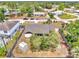 Aerial view of the property, showcasing the fenced backyard and storage shed at 2317 Clearwater Dr, Deltona, FL 32738