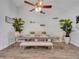 Inviting dining room with wood floors, a ceiling fan, and neutral decor, perfect for Gathering meals at 2317 Clearwater Dr, Deltona, FL 32738