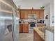 Kitchen showcases granite countertops, stainless steel appliances, and ample cabinet space at 2317 Clearwater Dr, Deltona, FL 32738