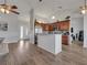 Spacious open-concept design seamlessly integrating the kitchen and dining areas with modern features at 2317 Clearwater Dr, Deltona, FL 32738