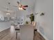 Open floor plan showing the dining area connecting seamlessly to the kitchen with stainless steel appliances at 2317 Clearwater Dr, Deltona, FL 32738