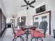 Covered patio with outdoor seating, a ceiling fan, and views of the backyard at 2317 Clearwater Dr, Deltona, FL 32738