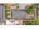 An aerial view of the home highlighting the roof, backyard, and surrounding neighborhood at 2602 Winter Park Rd, Winter Park, FL 32789