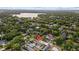An aerial view of the home in a desirable neighborhood near a beautiful lake and lush green spaces at 2602 Winter Park Rd, Winter Park, FL 32789