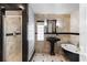 Beautiful bathroom with an enclosed glass shower, marble floors, and a pedestal sink at 2602 Winter Park Rd, Winter Park, FL 32789