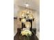 Stunning dining room showcasing unique pendant lighting and stone accent wall at 2602 Winter Park Rd, Winter Park, FL 32789