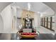 Chic dining room with stone fireplace and pendant lighting at 2602 Winter Park Rd, Winter Park, FL 32789
