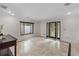 Stunning entryway with travertine flooring, a decorative front door, and natural light at 2602 Winter Park Rd, Winter Park, FL 32789