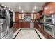 Well-equipped kitchen with stainless steel appliances and custom cabinetry at 2602 Winter Park Rd, Winter Park, FL 32789