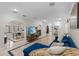 Spacious living area with modern lighting and view to dining area at 2602 Winter Park Rd, Winter Park, FL 32789